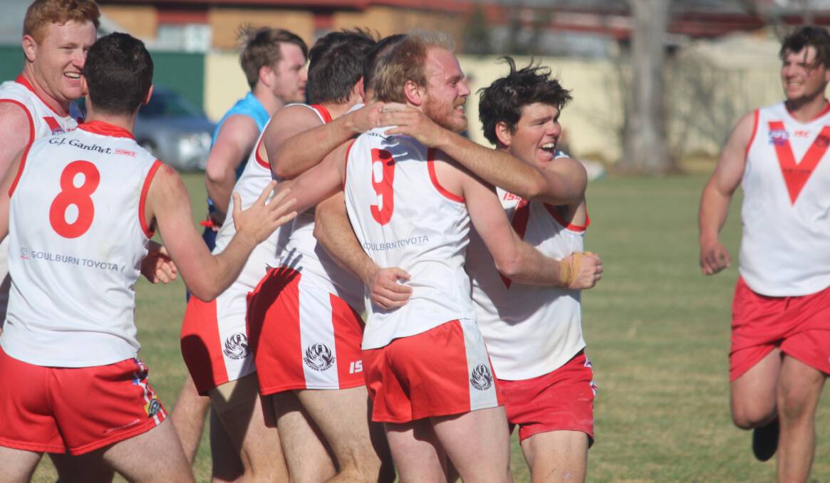 Celebrate: The Goulburn Swans knuckled down after their match was cancelled and put all their energy into fundraising. Photo: Zac Lowe.