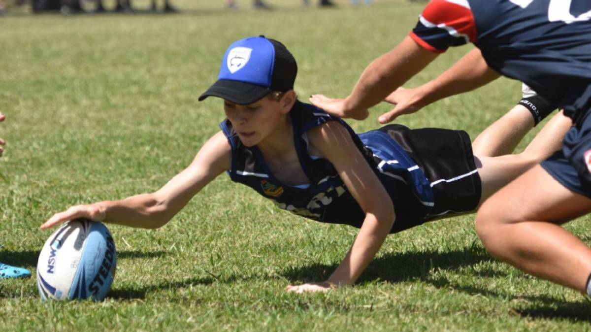 Diving touchdown: The Goulburn Touch Association has opened registrations and urged players to get in quick. Photo: Paul Jobber.