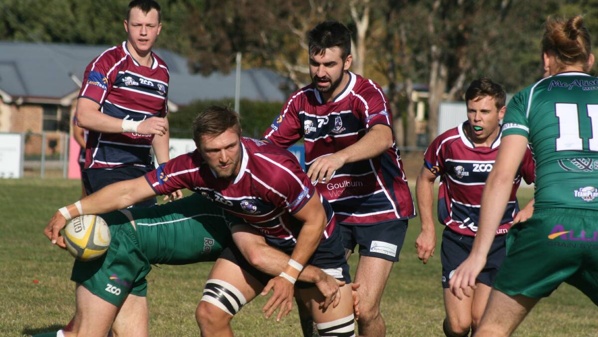 Tough win: Skipper Jordan Wilcox looks to sneak away an offload in Goulburn's 31-14 win against Young at Poidevin Oval. Photo: Chris Gordon. 