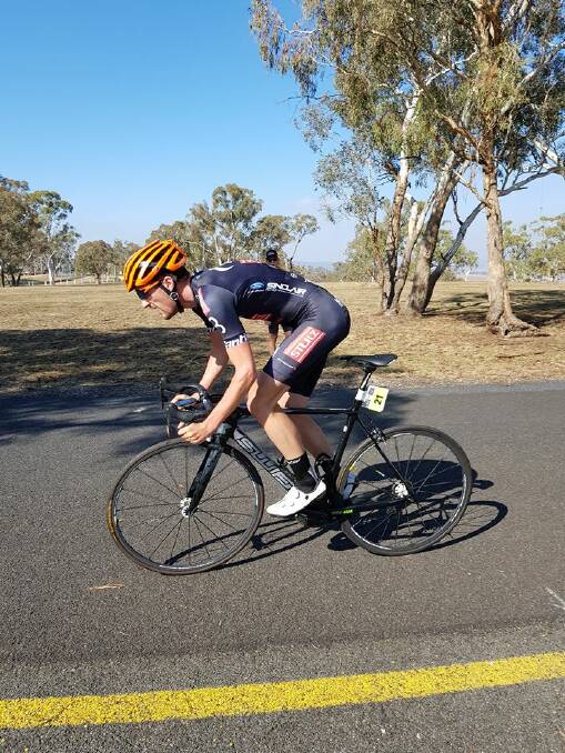 On the climb: Cameron Roberts competing in the Hill Climb event in Bathurst, where he placed second behind Ben Dyball. Photo: Goulburn Cycle Club.