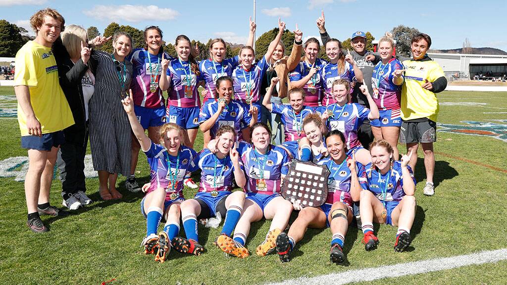 Premiership: John Sykes (back row, third from right) last coached the Goulburn Stockmen women to an impressive premiership victory. Photo: Canberra Region Rugby League.