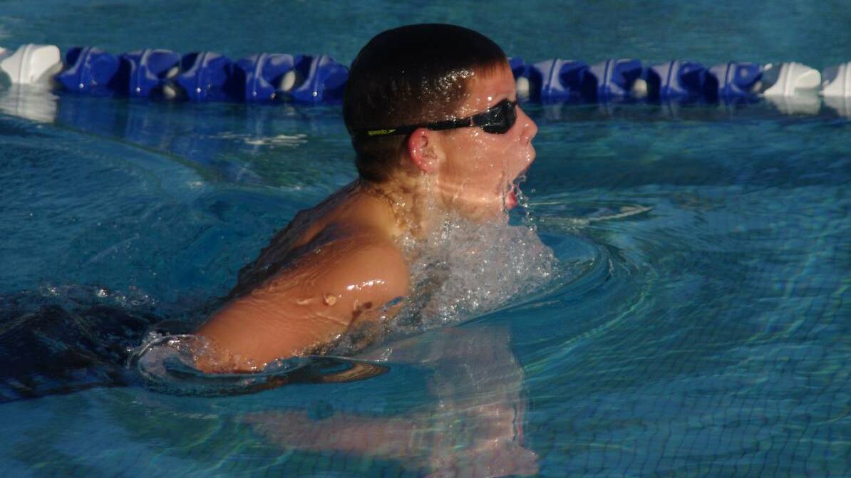 A breather: The development meet will give young swimmers the opportunity to improve their personal best times for future carnivals. Photo: Darryl Fernance. 