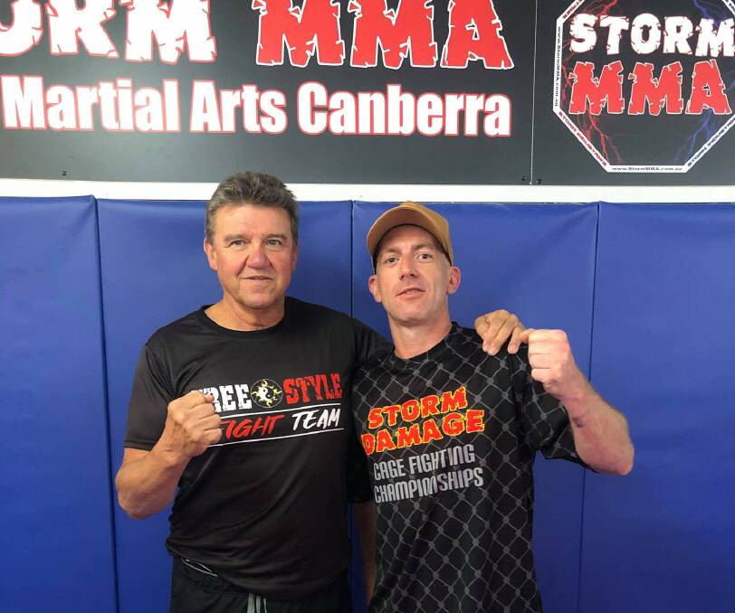 Guard up: Sullivan (right) alongside prominent Australian MMA coach Joe Lopez, in Storm Damage attire. Photo: Darcy Sullivan/Facebook. 