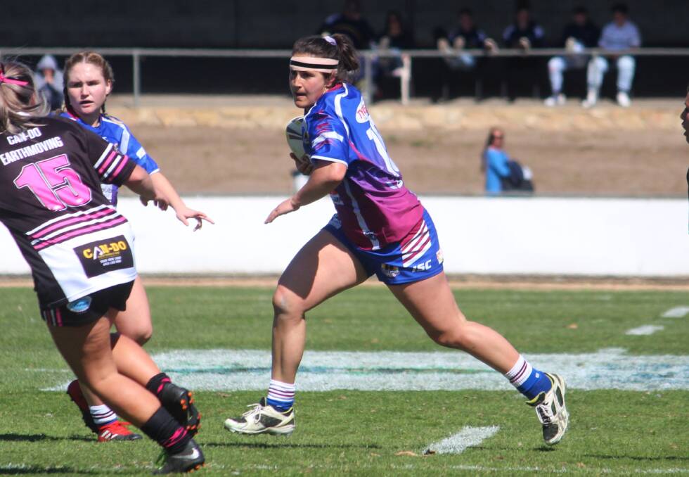 Sidestep: Sass Economos manoeuvres through the field during Goulburn's successful 2018 grand final against the Yass Magpies, an experience she will draw on in 2020. Photo: Zac Lowe.