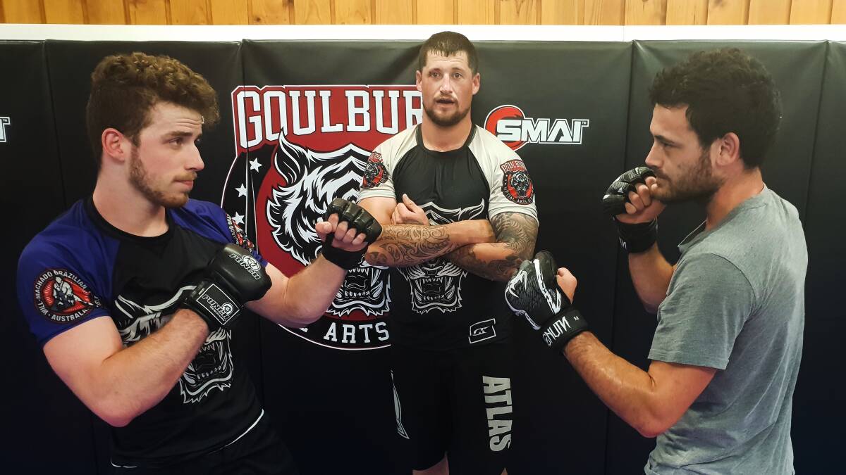 Ready to fight: (from left) Hayden Ellis, Dave Sturgiss, and Chevy Apanui will return to the cage next April for their second amateur MMA bouts. Photo: Zac Lowe.