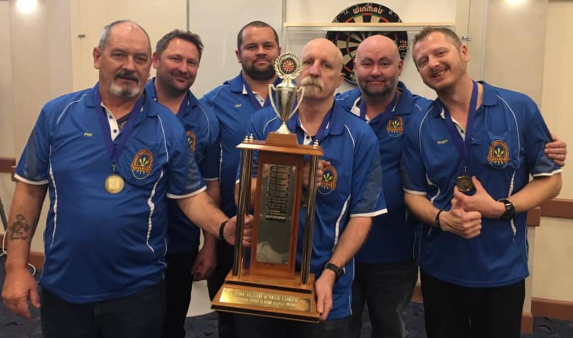 In return: Many members of the GDDA's men's team (seen here after winning the 2019 Southern Districts competition) will be eager to get back into the sport next week. Photo: Goulburn District Darts Association/Facebook.