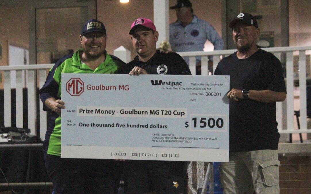 Big win: Simon Fitzsimmons (centre) accepts the $1,500 cheque after his team's win, alongside GDCA president and opposing captain, Shane Munroe (left). Photo: Zac Lowe.
