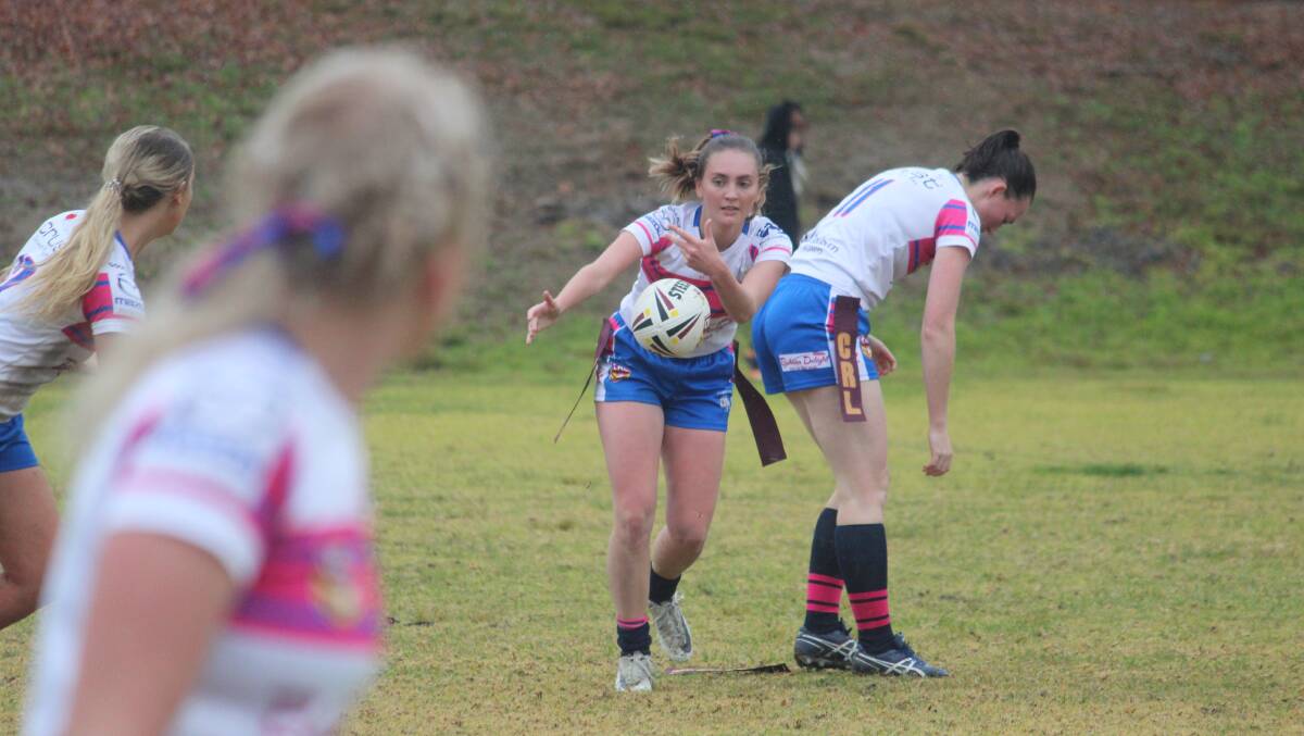 Dummy ball: Grace Marshall passes the ball out of dummy half during Goulburn's 4-0 loss to Yass in the ladies' league tag. Photo: Zac Lowe