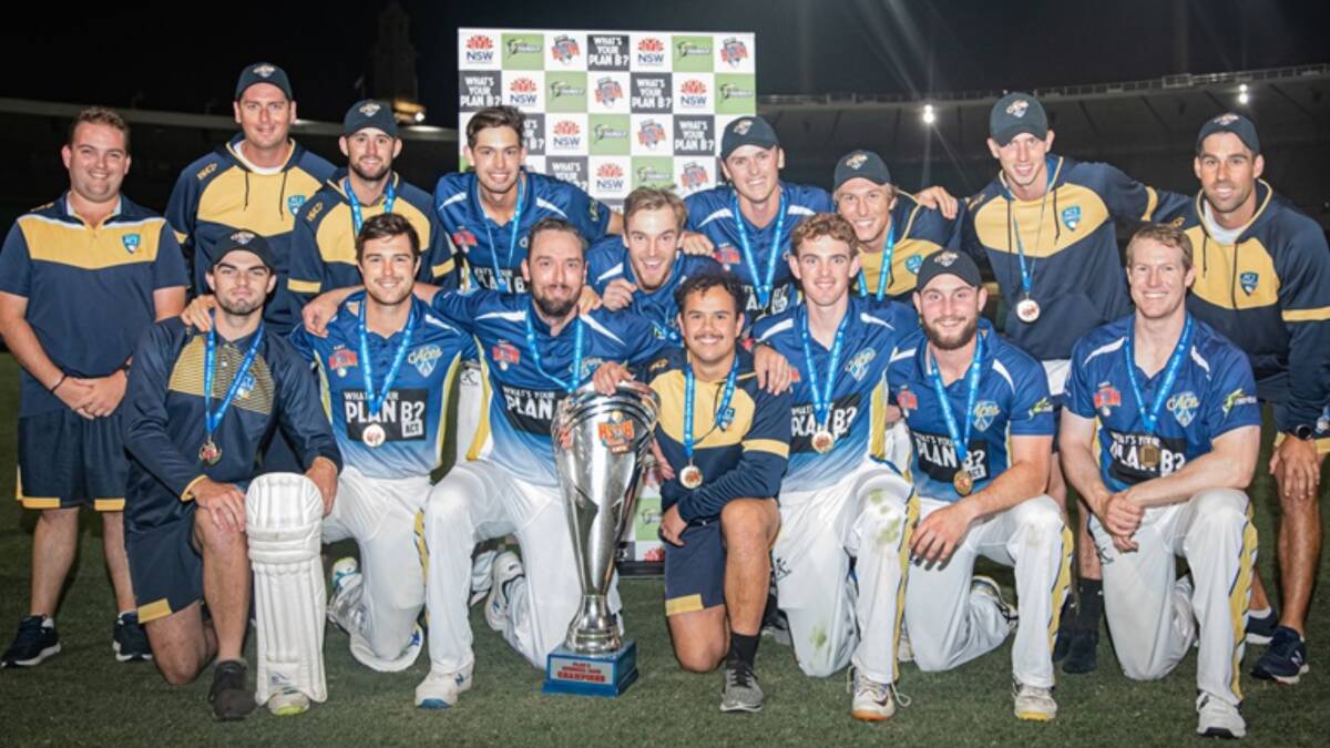 At last: Ollie Anable (back row, fourth from right) celebrates with his ACT Aces teammates after their win at the SCG last Monday. Photo: Ben Churcher/Cricket NSW.