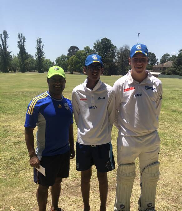 Standouts: ACT U15 Emerging Comets Coach Rukshan Abeyaratne with Abdul Raheem and Callum Smith during their stint in the Comets side. Photo: Supplied.