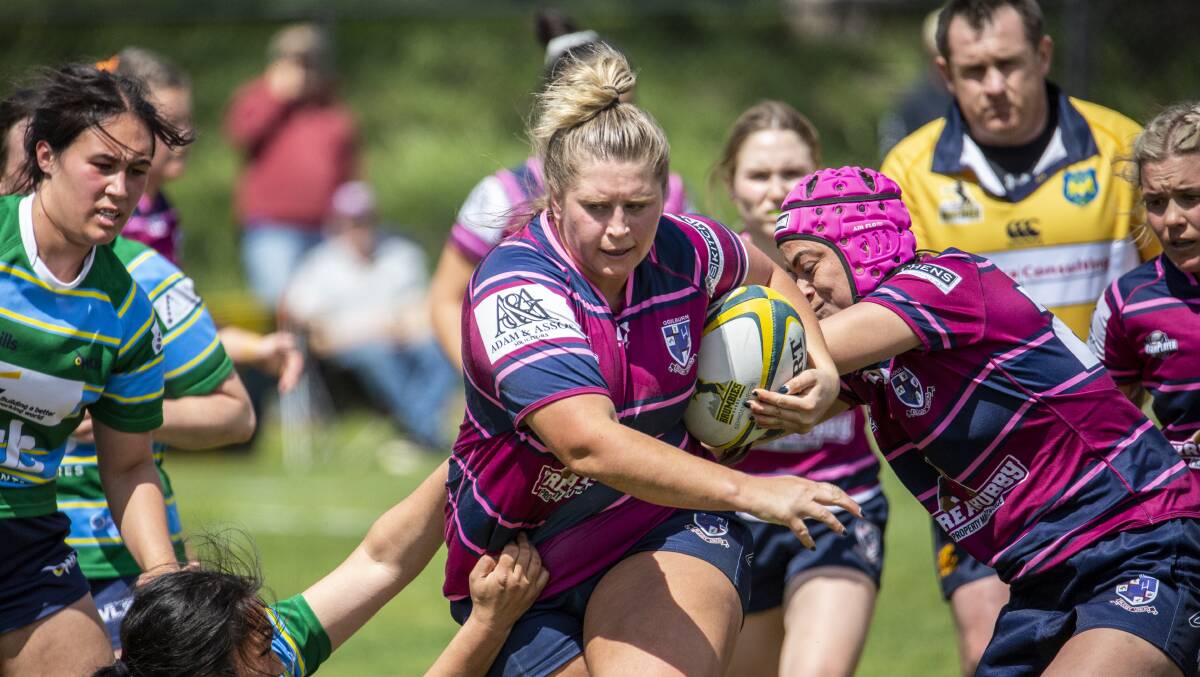 On the charge: Paige Penning barges through the Uni North Owls' defence during the 2020 season. Photo: Peter Oliver. 