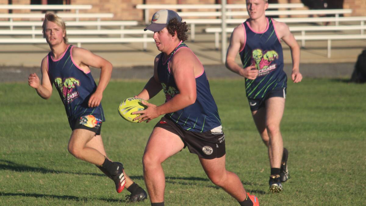 On the charge: All the emotion and high quality action will be on display at Carr Confoy this week during the Goulburn Touch Association grand finals. Photo: Zac Lowe.
