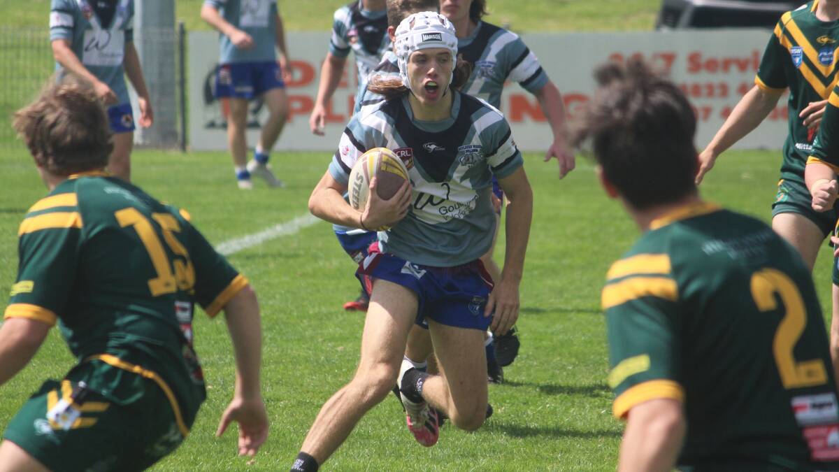 Sidestep: The Bulldogs Under 19s got off to a fast start, but were reigned in by a determined Lions outfit. Photo: Zac Lowe.