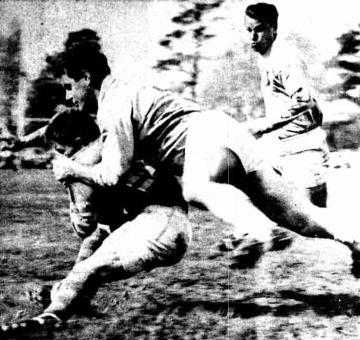 Physical: Queanbeyan's Ron Thomas tackles George Osmond of Goulburn during the 1965 Group Eight grand final.