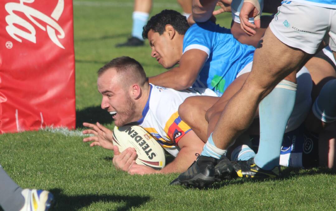 Elation: Tyson Greenwood, seen here as he crosses for a try against the Queanbeyan Blues, is the latest player named in the NSW Country Under 23 squad. Photo: Zac Lowe.