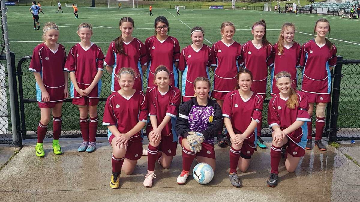 The girls: The Under 15's girls would go on to make it to the semi-finals of the Champion of Champions tournament. Photo: Supplied.