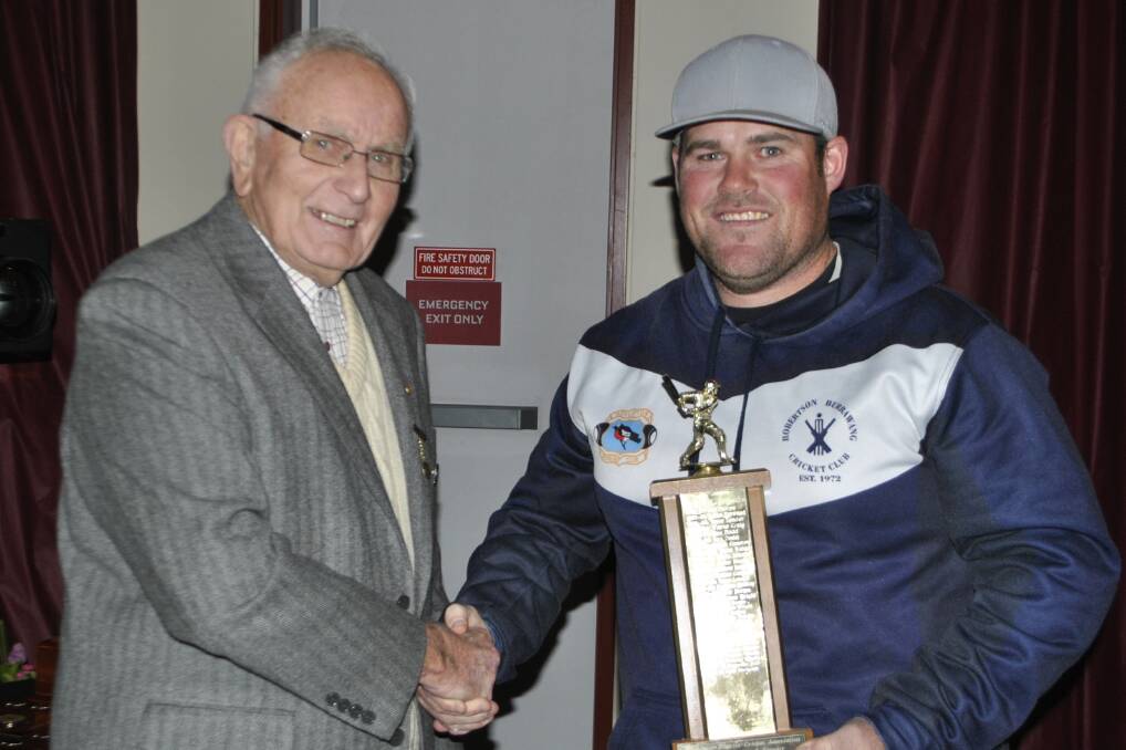 Starting off: Dean Roxburgh, seen here accepting the Highlands District Cricket Association's Player of the Year award in 2019, will play for MBK's first grade side in 2021/22. Photo: Highlands District Cricket Association. 