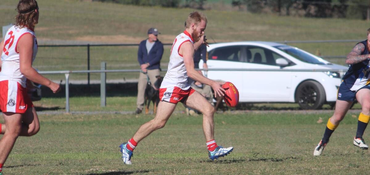 Shaping up: Simon Treloar lines up a kick for the Goulburn Swans. The player and coach said that his team is gaining valuable experience in 2019. Photo: Zac Lowe.