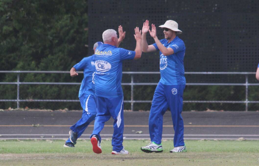 Celebrate: The Tatts Stags celebrate a wicket during their four-wicket win over St Joseph's at Seiffert Oval yesterday. Photo: Zac Lowe.