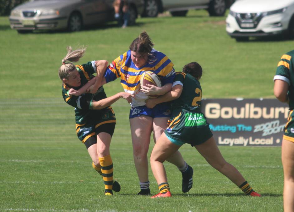 On the charge: Goulburn's senior women played a tackle match for the first time in over two years on Saturday. Photo: Zac Lowe.