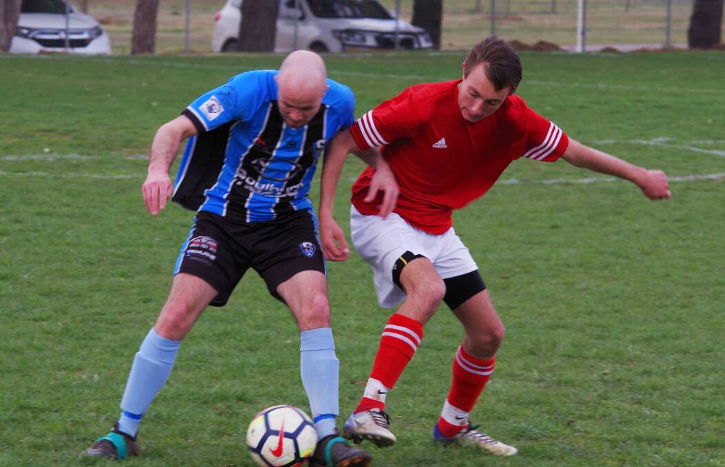 Footwork: Tommy Sansom jockeys for possession on Saturday during the Stags' 6-2 victory over the Crookwell Griffins. Photo: Darryl Fernance