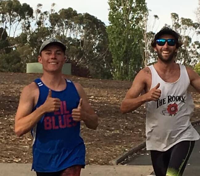 Off and running: Mitch Drapalski (blue singlet), who came third in the intermediate distance, narrowly ahead of Kurt Warn who was first in the long distance. Photo: Supplied.