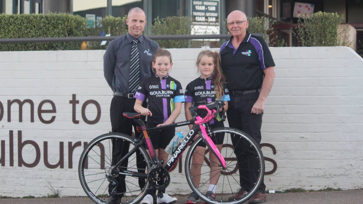 Ready to race: (from left) Anthony Hogan - of the Goulburn Workers Club - with Elsie Apps, Indie Champion, and Graeme Northey of the Goulburn Cycle Club. Photo: Zac Lowe.