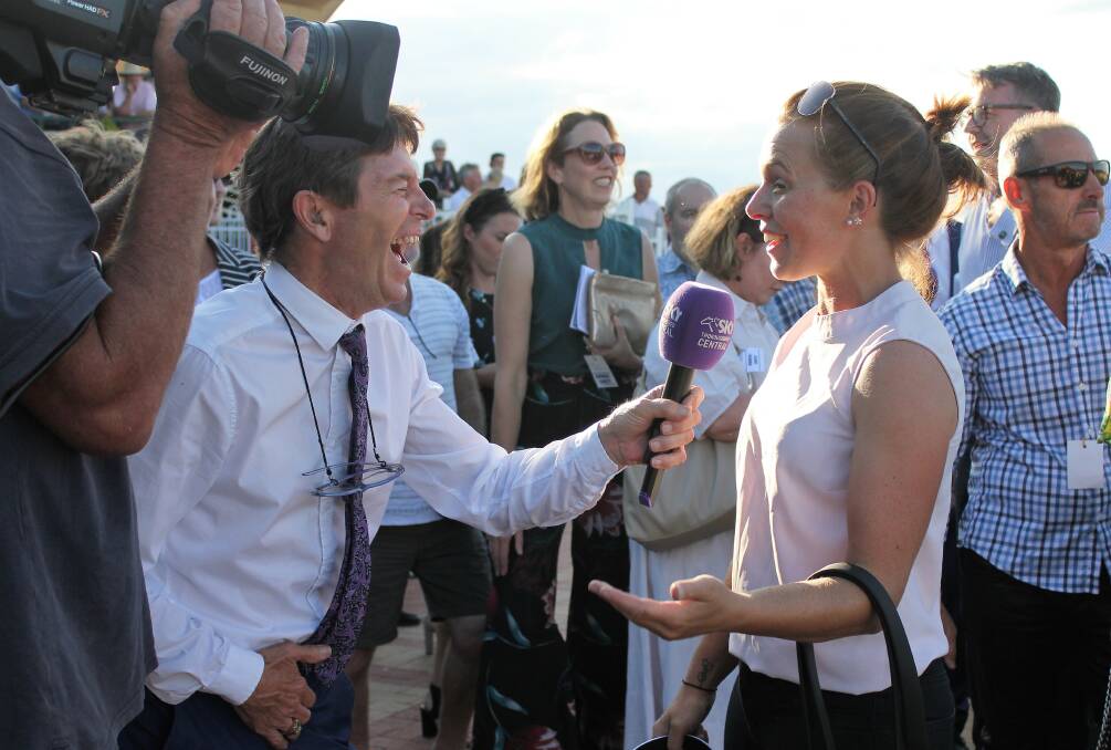 Winner's chat: Tash Burleigh in the midst of an animated discussion with Sky Racing commentator John Scorse. Photo: Ainsleigh Sheridan. 