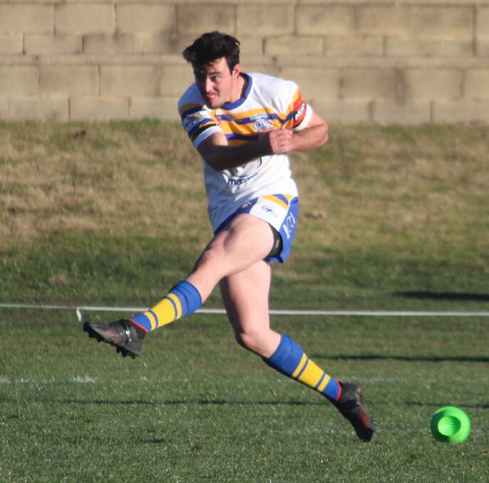 Launched: Chris Hart kicks his only conversion for the afternoon against the Queanbeyan Roos on Saturday, where the Bulldogs fell short by four points in a nailbiting game. Photo: Zac Lowe.