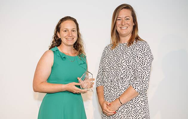 Well-earned: Claire Polosak (left) receives the Her Sport Her Way Champion award in March this year. Photo: Cricket NSW.