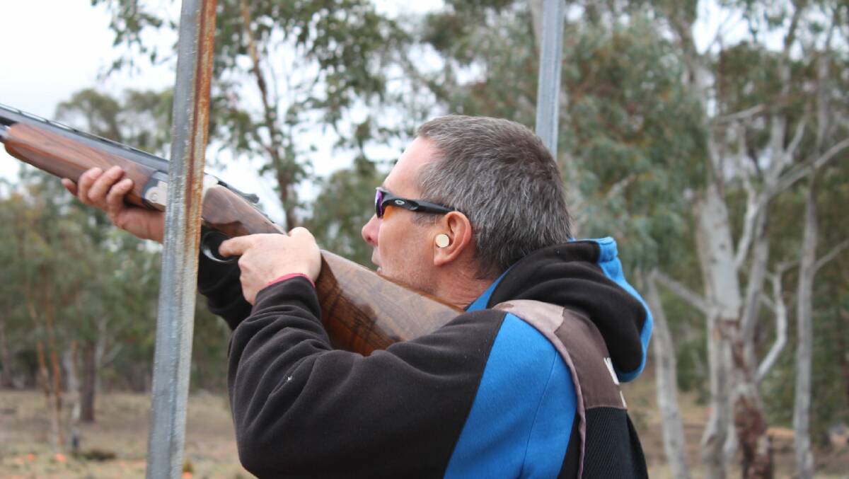 Take aim: Dave Whiteman lines up a shot during the club's June shoot last month, which was also highly competitive. Photo: Goulburn Clay Target Club. 