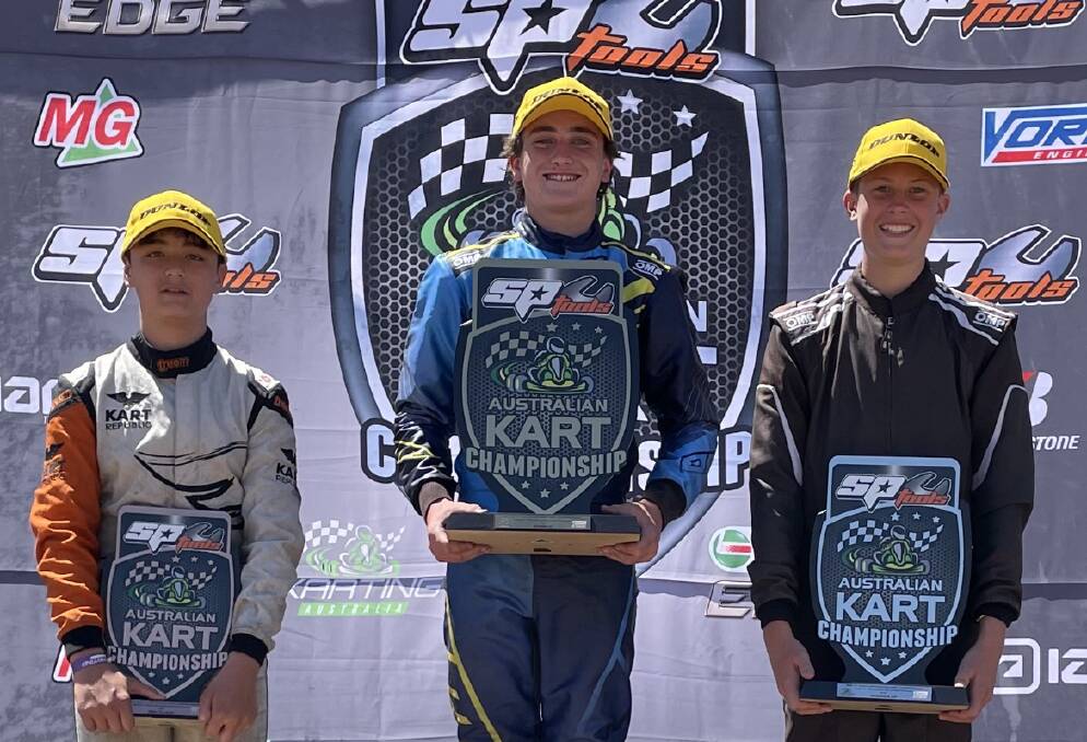 Perfect end: Costa Toparis (centre) overcame an imperfect lead-in to the Australian Karting Championship finals a week ago to claim first place in the last race of the season. Photo: Supplied. 