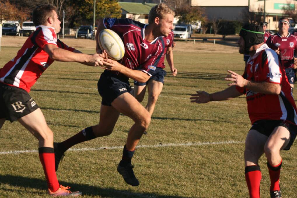 Break through: The Goulburn Dirty Reds first grade side extended their winning streak to seven matches on the weekend against Cooma. Photo: Chris Gordon.