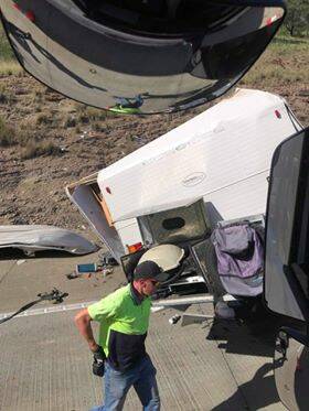 A car and caravan crash has closed one southbound lane on the Hume Highway.  Photos: Steve Caunt