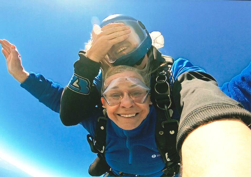 DON'T LOOK DOWN: Great grandmother Rita Strownix poses for the camera at 15,000 feet off the ground. Picture: Supplied 