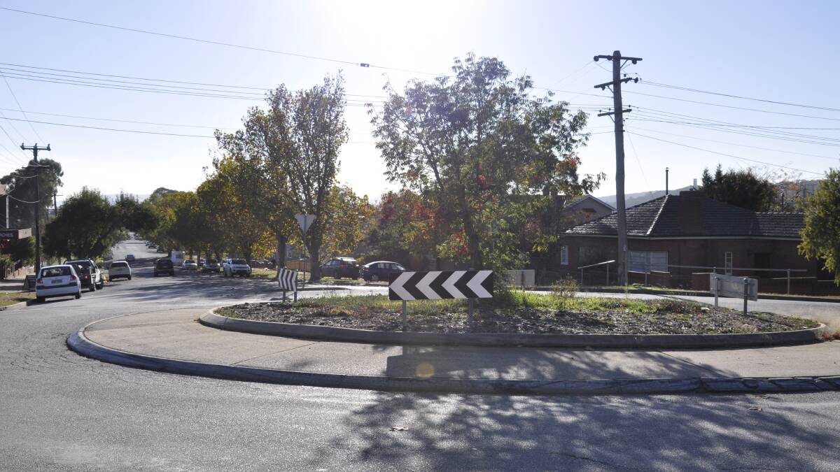 Trees in streetscapes, including roundabouts, are a waste of money that could go instead to reducing rates, writes Grant Pearce. Photo: file