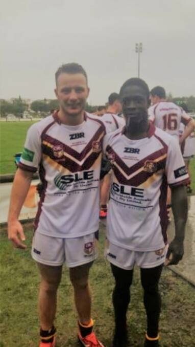 Goulburn boys: Jack Peppernell (left) with Menker Lowah during their North Coast tour with the NSW Country Under 16s, which featured matches against Papua New Guinea and the Gold Coast Titans. Photo: supplied