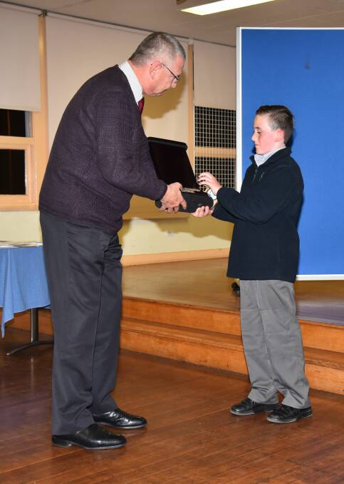 Former Goulburn Mulwaree mayor Geoff Kettle presented the event’s winner, Costa Toparis from Goulburn West Public School, with his winner’s trophy.