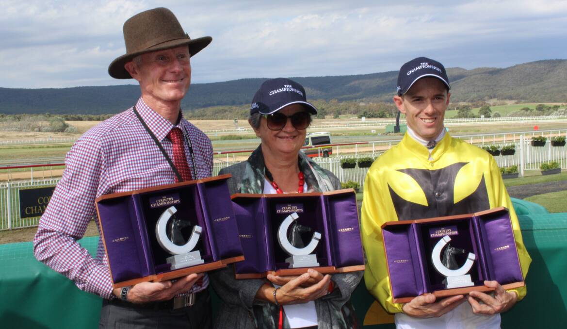 Trainer Danny Williams, owners' syndicate member June Baker and jockey Jay Ford take the Goulburn qualifier for the Country Championships. Photo: David Dawson