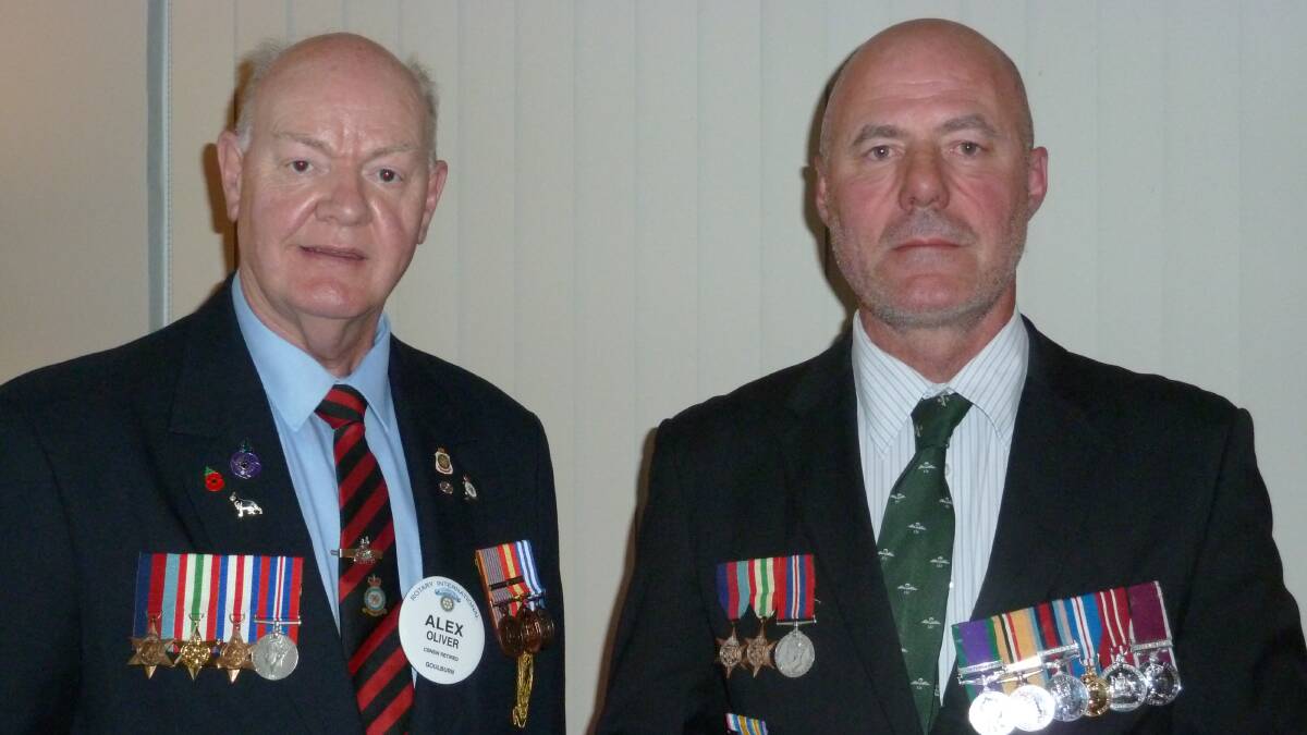 Former Colour Sergeant Tim Holmes of the British Parachute Regiment, right, with Goulburn Rotarian Alex Oliver, gave an interesting, informative and highly presented talk of his service. Photo: supplied