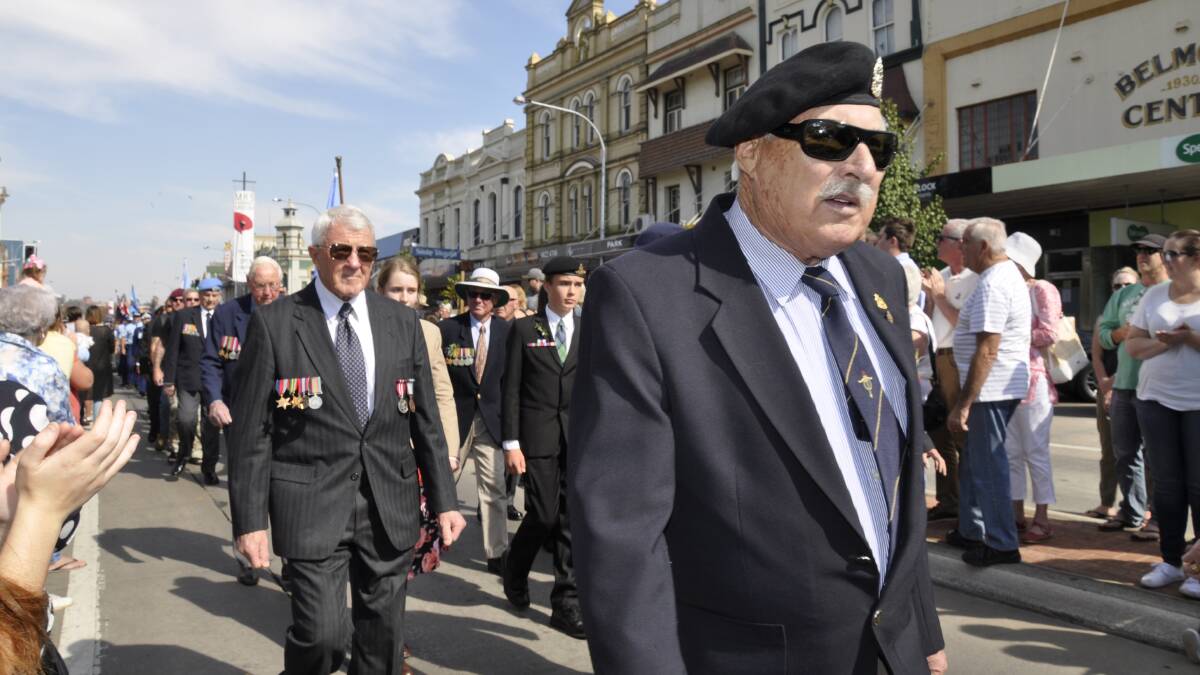 LEST WE FORGET: Veterans of the National Service in the Auburn Street march on Anzac Day 2018. Photo: Louise Thrower