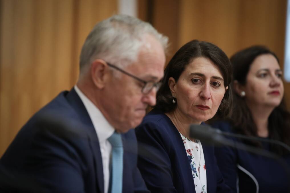 Prime Minister Malcolm Turnbull and NSW Premier Gladys Berejiklian during a joint press conference after the Council of Australian Governments (COAG) meeting at Parliament House in Canberra in February 2018. Photo: Alex Ellinghausen