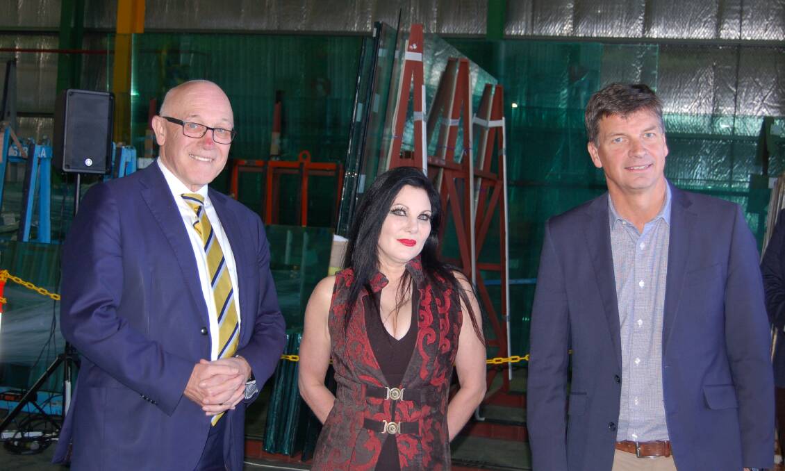 NSW Finance and Small Business Minister Damien Trudehope, Kate Wendt, and the Angus Taylor gathered at the Bradfordville factory on Friday. Photo: Nicholas Fuller.