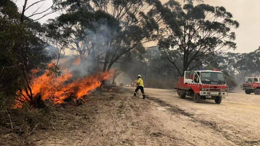 Gunning RFS colleagues working across the Southern Tablelands firegrounds earlier this year. Photo: Krystaal Hinds.