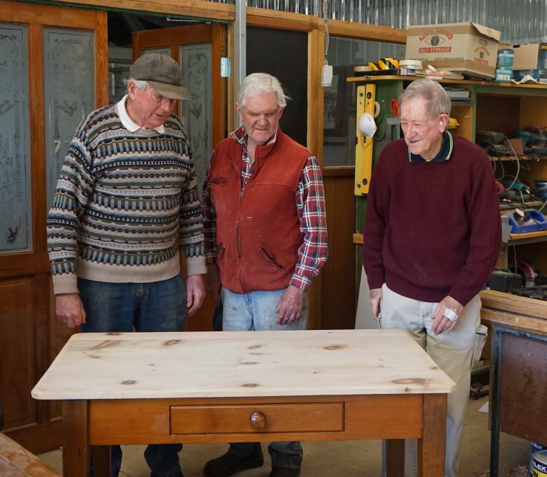Crookwell Men's Shed secretary Don Southwell (right) with Rob Browne and president John Medway.