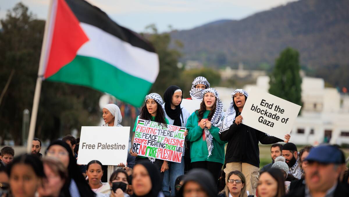 People protesting in support of Palestine outside Parliament House earlier this year. Picture by Sitthixay Ditthavong