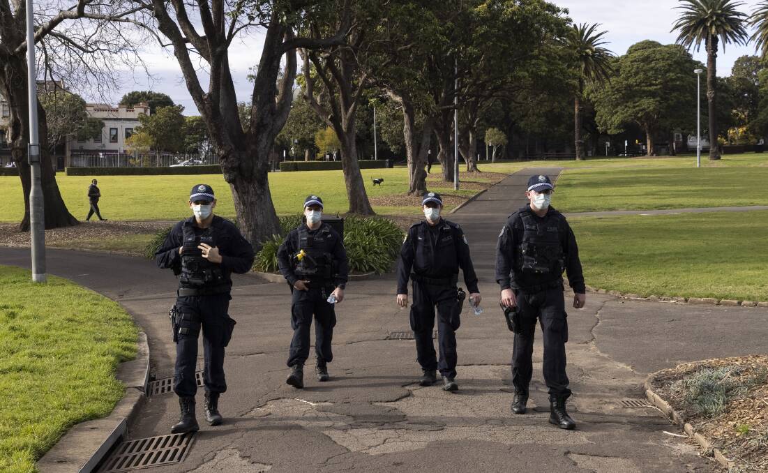 Police patrol Victoria Park just before 9am on Saturday in Sydney, Australia. Picture: Getty Images