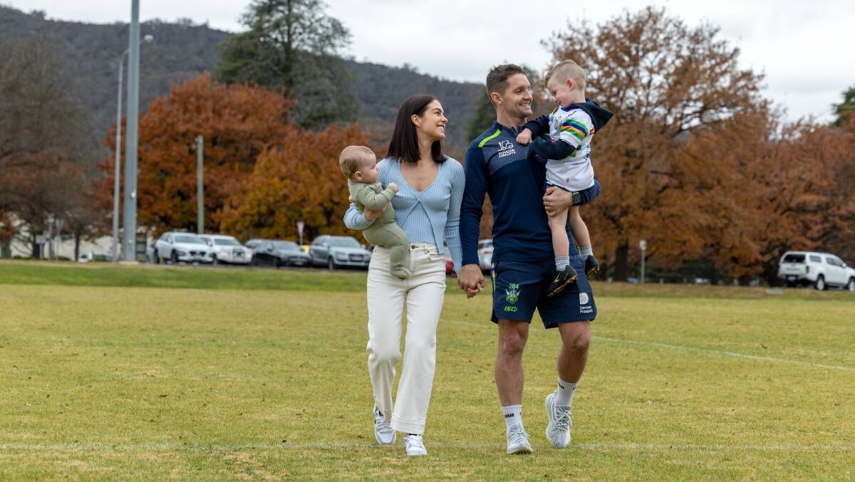 The Croker family - Tate, Brittney, Jarrod and Rory - enjoy a stroll at Raiders HQ on Monday. Picture by Gary Ramage
