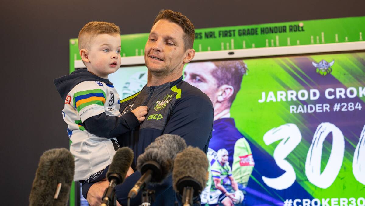 As Raiders co-captain Jarrod Croker, held his son Rory at the press conference, it finally sunk in how big 300 games is. Picture by Gary Ramage