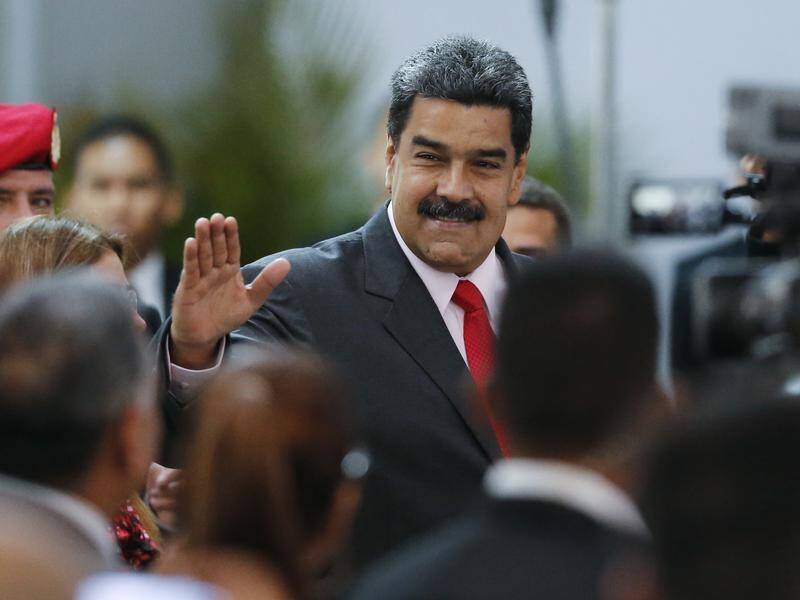 Venezuela's President Nicolas Maduro has expelled two US envoys over Trump administration sanctions.